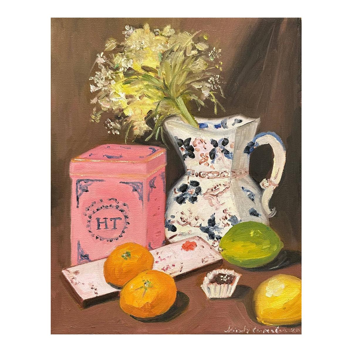Still life painting with a pink box, floral arrangement, and fruits on a brown background