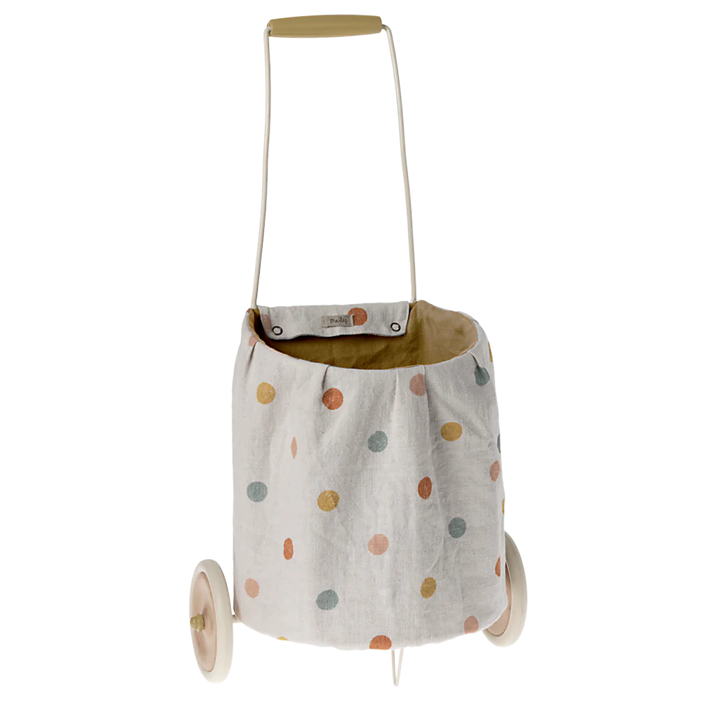 A multi-dot patterned yellow trolley with a fabric covering, featuring a handle and wheels for mobility.