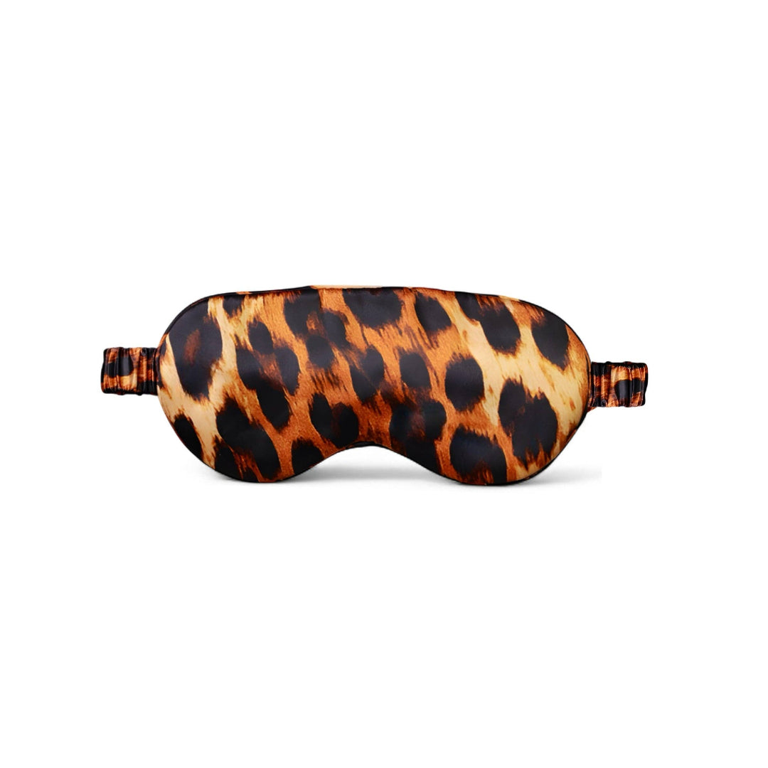Leopard print eye mask on a white background