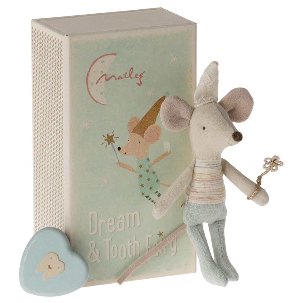 A toy mouse with a grey and blue outfit, sitting next to a blue tooth box and a matchbox decorated with stars and the text 'Dream & Tooth Fairy'.