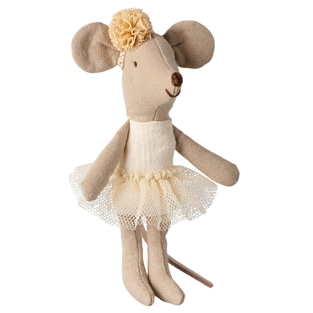 A toy mouse dressed as a ballerina with an off white tutu and headband, with a flower decoration on the headband.