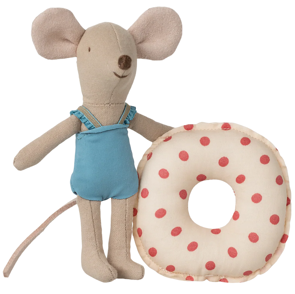 Stuffed mouse toy in overalls holding a polka dot donut on a white background