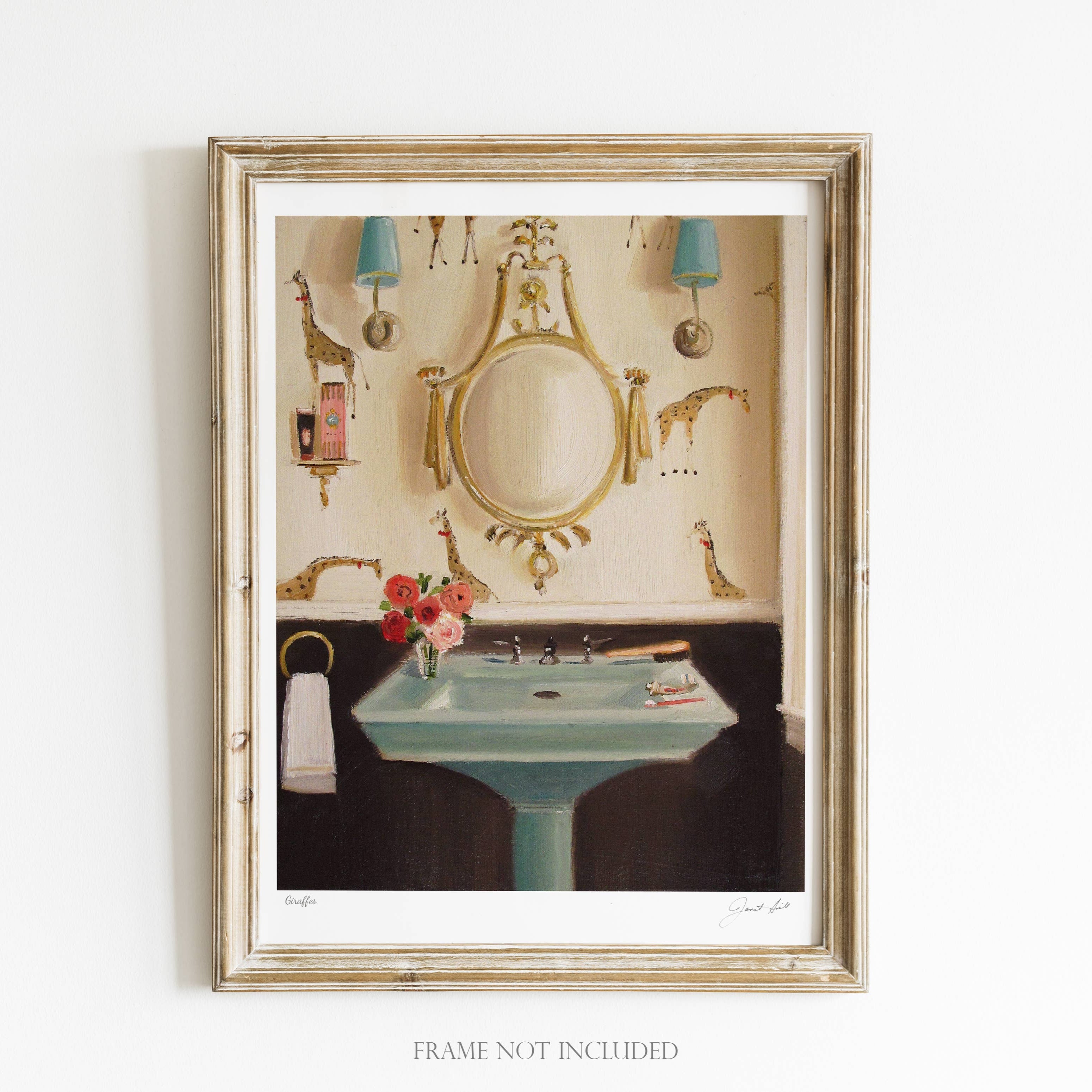 A framed art print featuring a giraffe in a vintage room setting, with a mirror, candle holders, and a table in the background. The frame is wooden and the artwork is signed by the artist.
