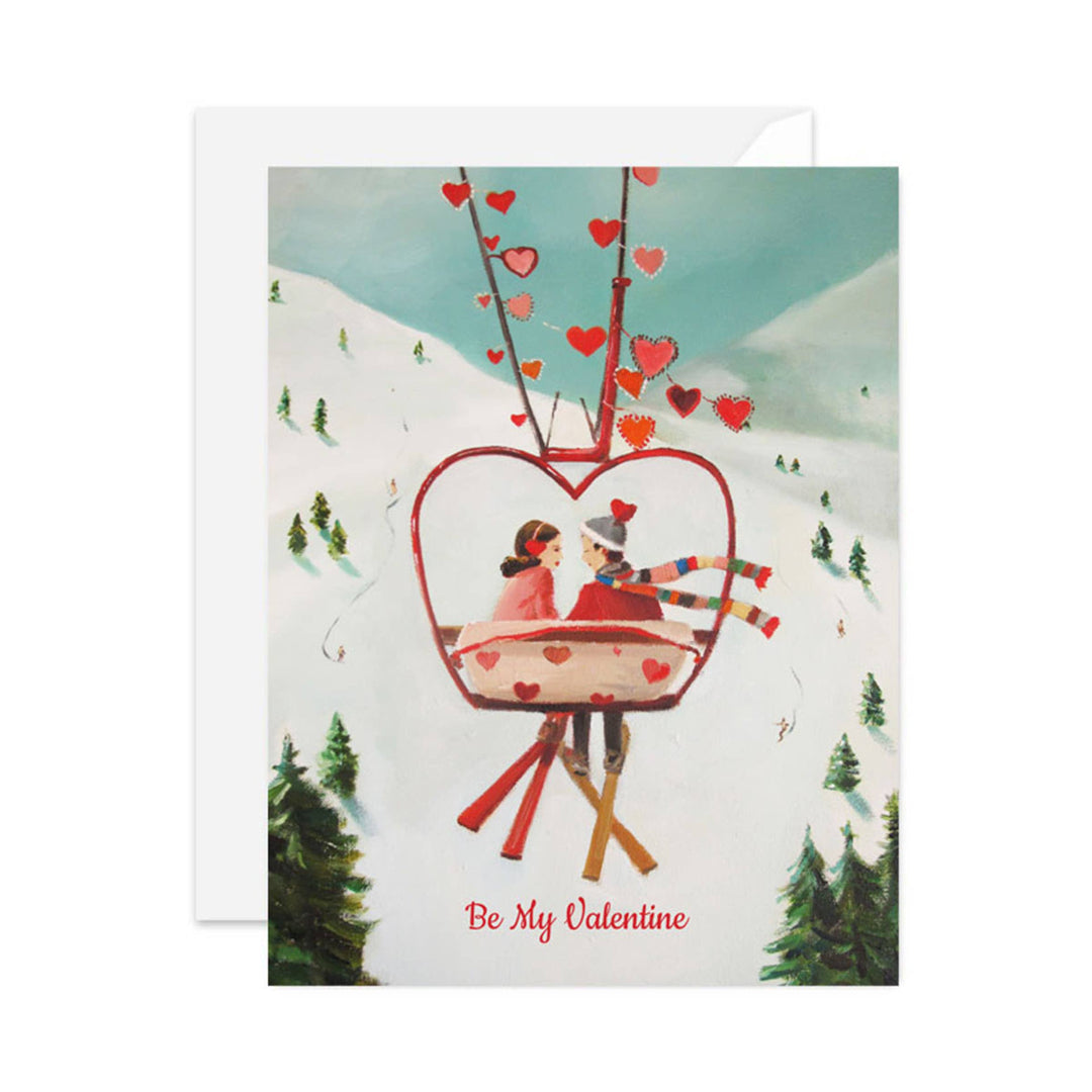 Valentine's Day card with a heart-shaped ski lift and two people on a snowy mountain.