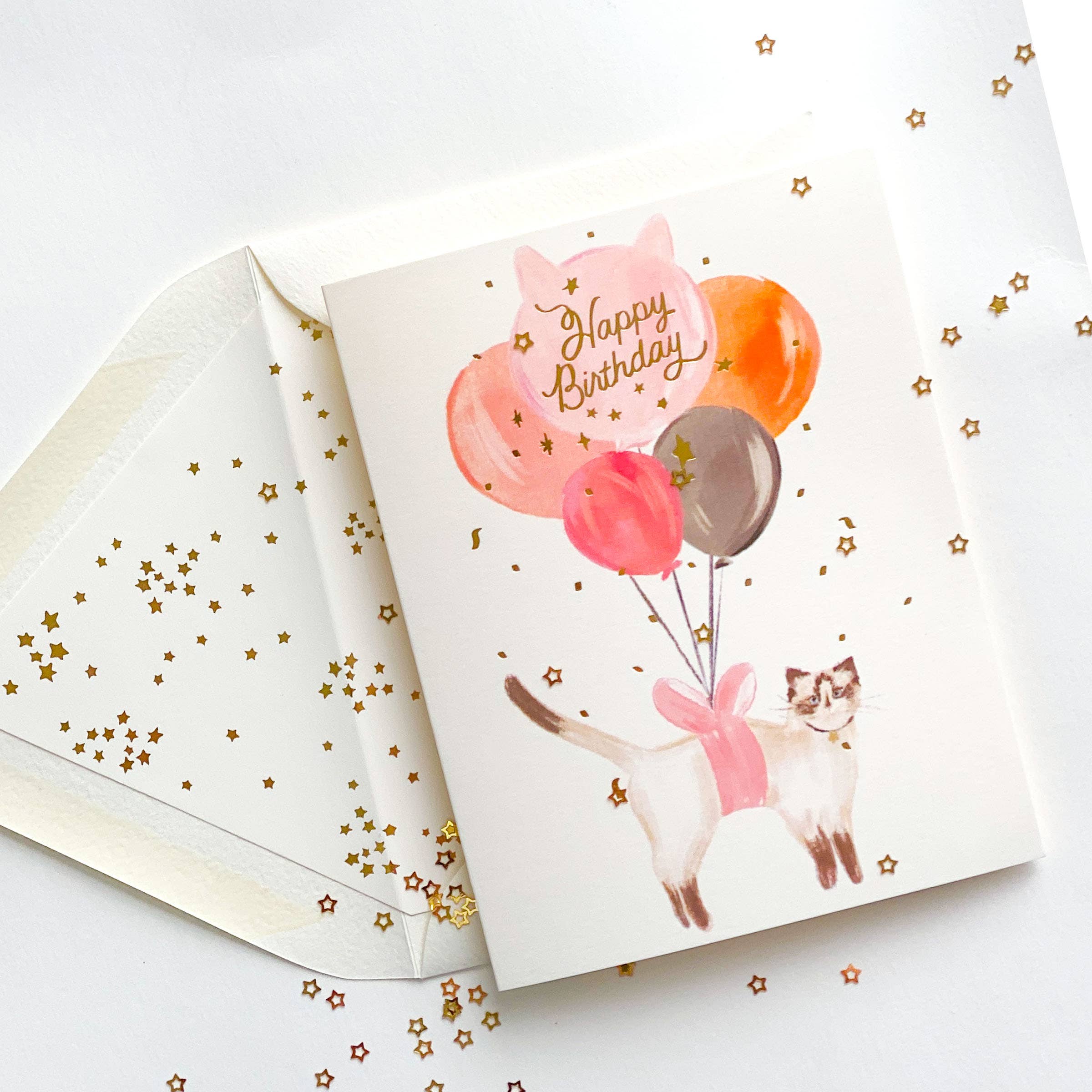 The First Snow - Happy Birthday Balloon Cat with Gold Confetti Greeting Card