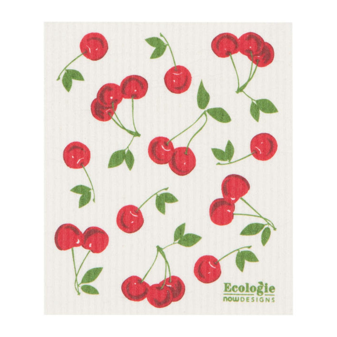 Dishcloth with cherry design and 'Ecologie Now Designs' branding on a white background