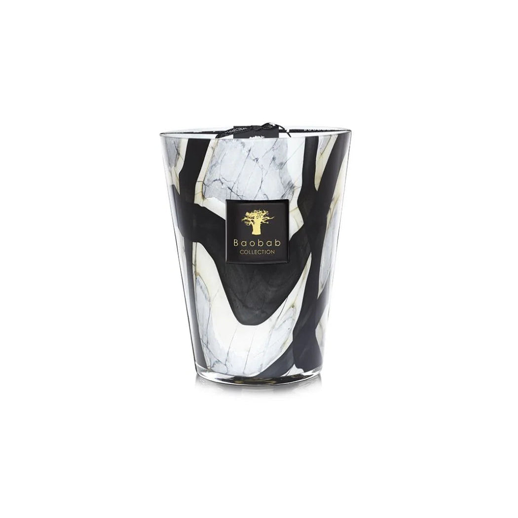 A collection of Baobab brand scented candles in marble effect glass holders, in various sizes.