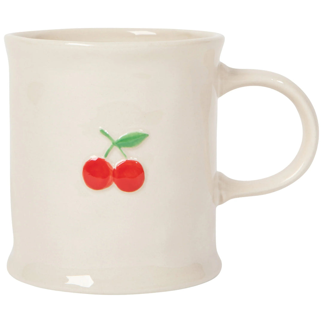 White mug with red cherries and green stem on a white background