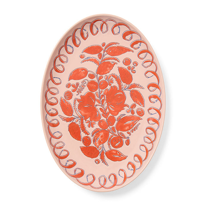 Decorative plate with floral design on a white background