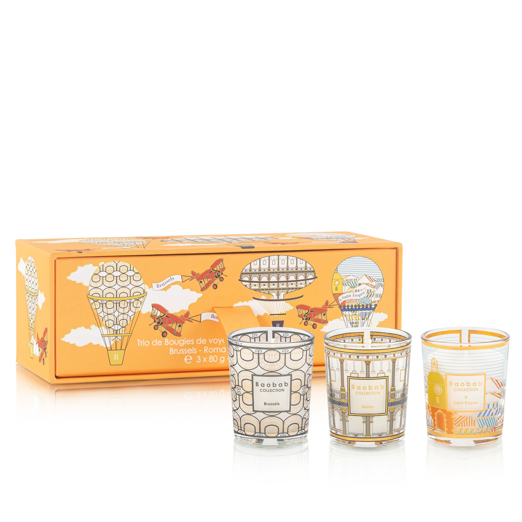 Three decorative candles with a matching box featuring airship and airplane designs on a white background.