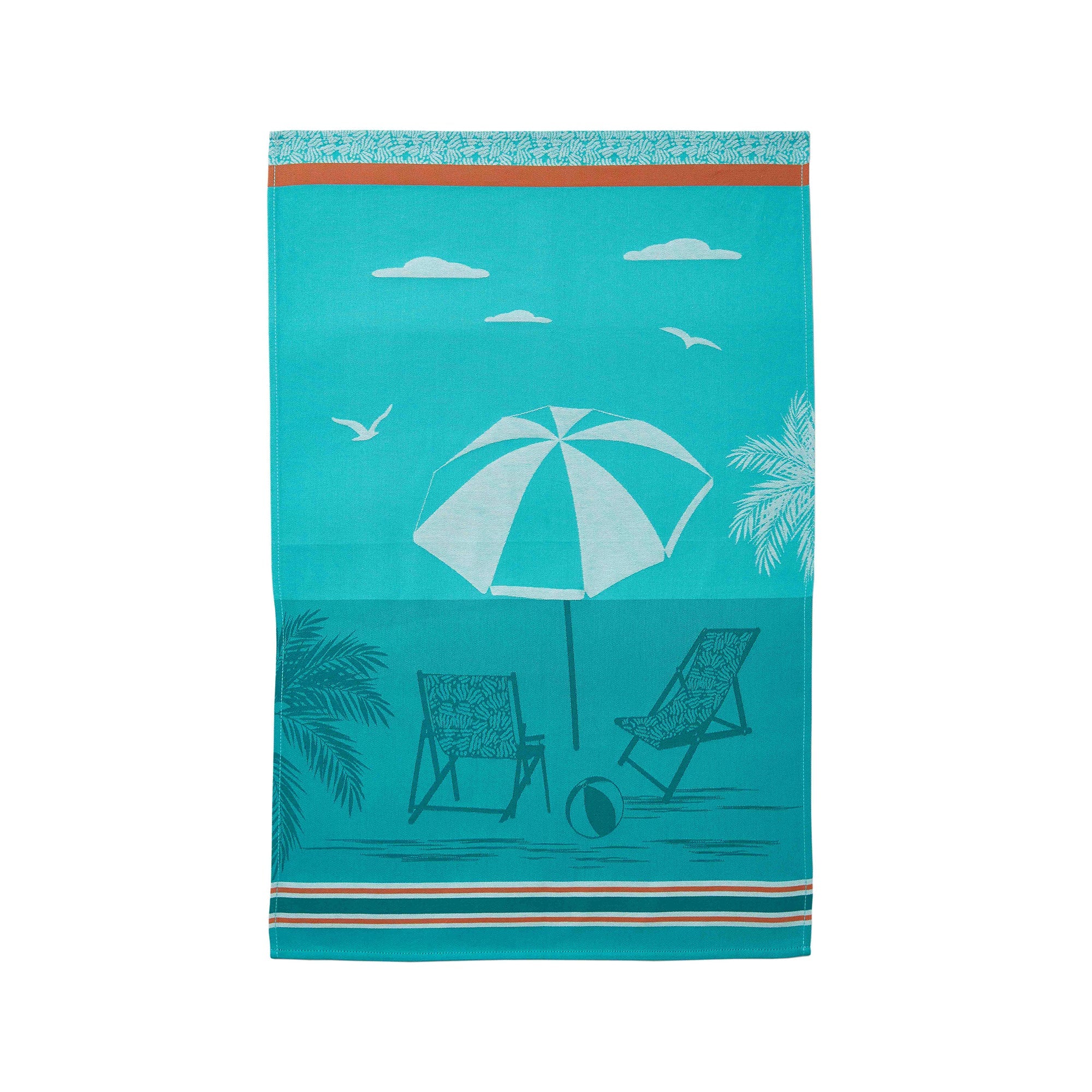 A jacquard cotton tea towel with a beach-themed design, featuring an umbrella, palm trees, birds, and beach chairs on a blue background.