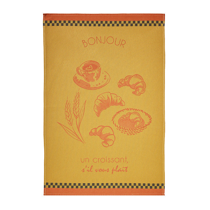 Yellow towel with French text and bread illustrations on a white background