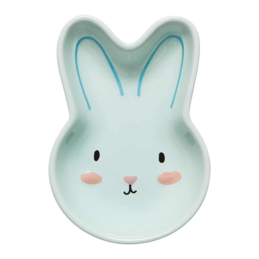 Ceramic rabbit-shaped bowl with a face on a white background