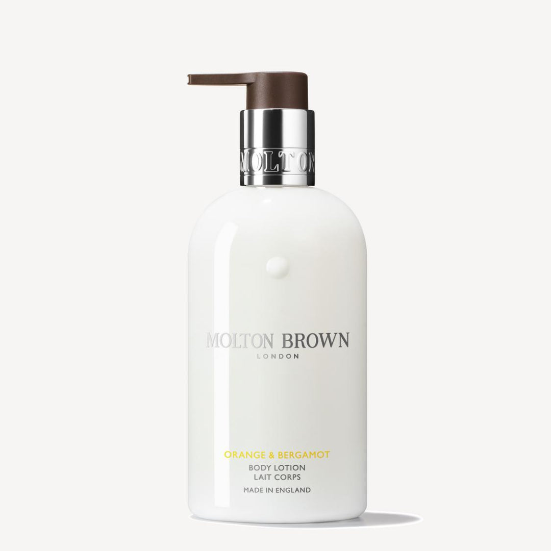 Molton Brown body lotion bottle on a white background