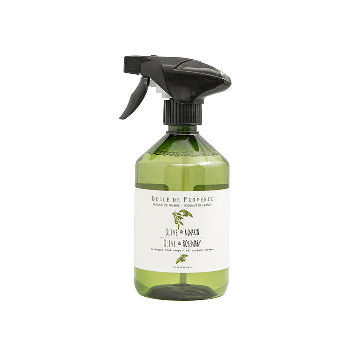 Green spray bottle with black nozzle on a white background