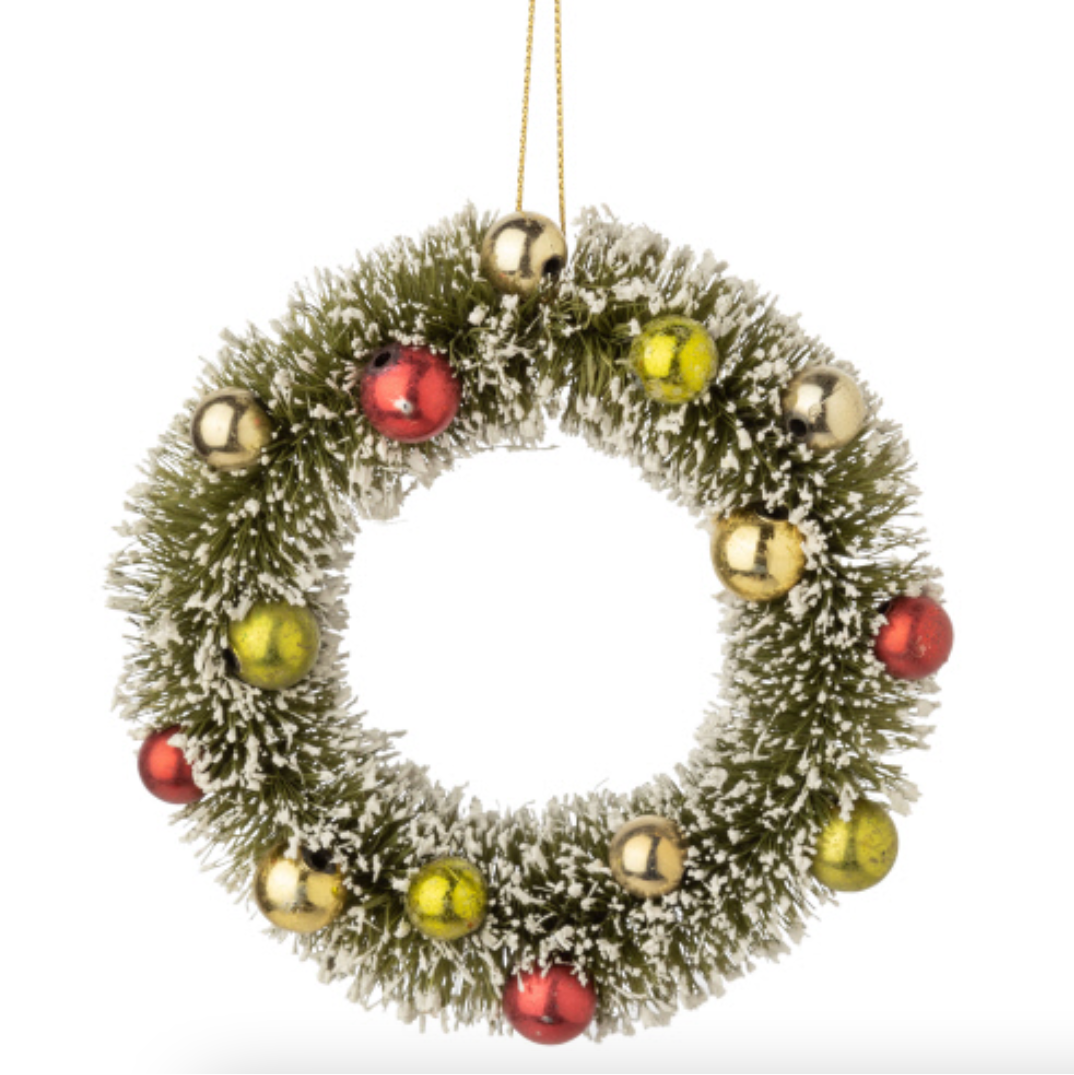 Decorative Christmas wreath ornament with colorful ornaments on a white background