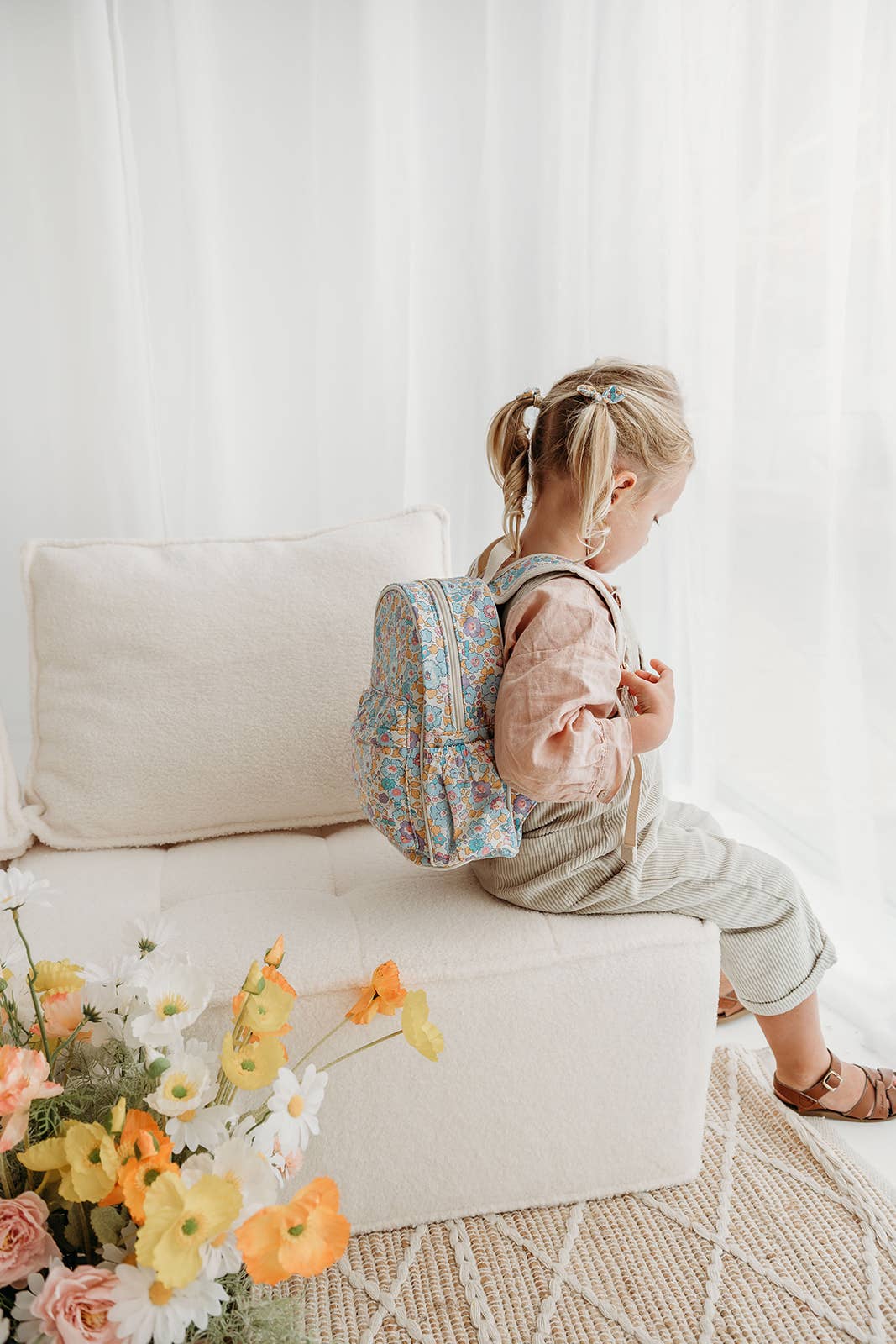 Toddler Sitting with Eadie Liberty London Backpack