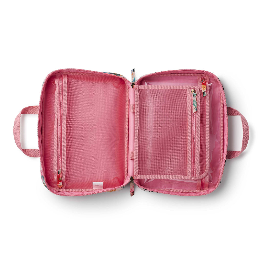 Inside of travel bag, pink, with open compartments on a white background