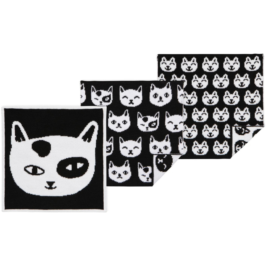 Set of black and white cat-themed dishcloths
