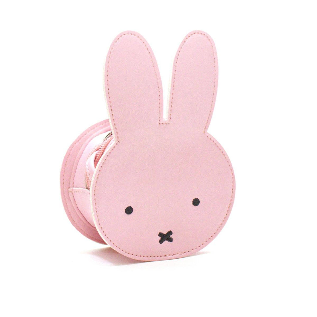 Pink bunny-shaped pouch on a white background