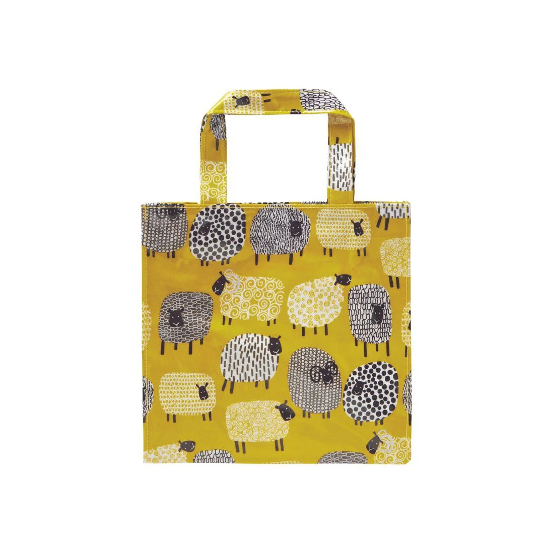 A yellow PVC bag with a pattern of sheep in various shades of gray and white.