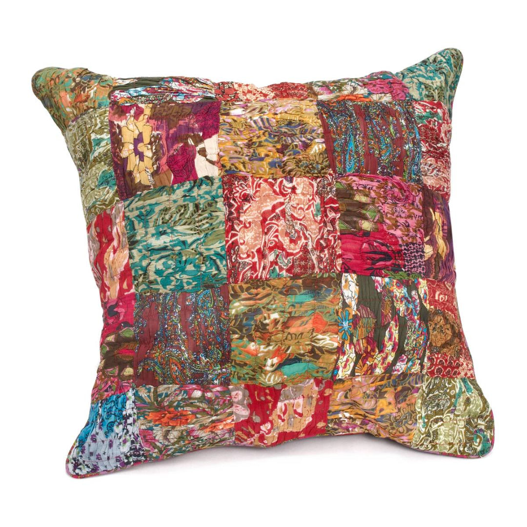 Multicolored patchwork pillow on a white background