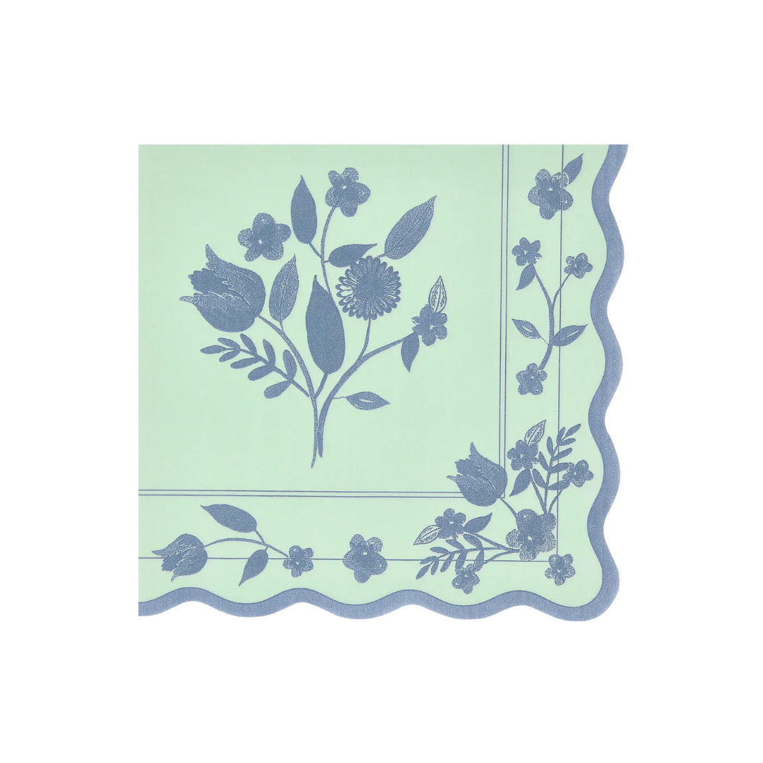 Decorative napkin with floral pattern on a light green background