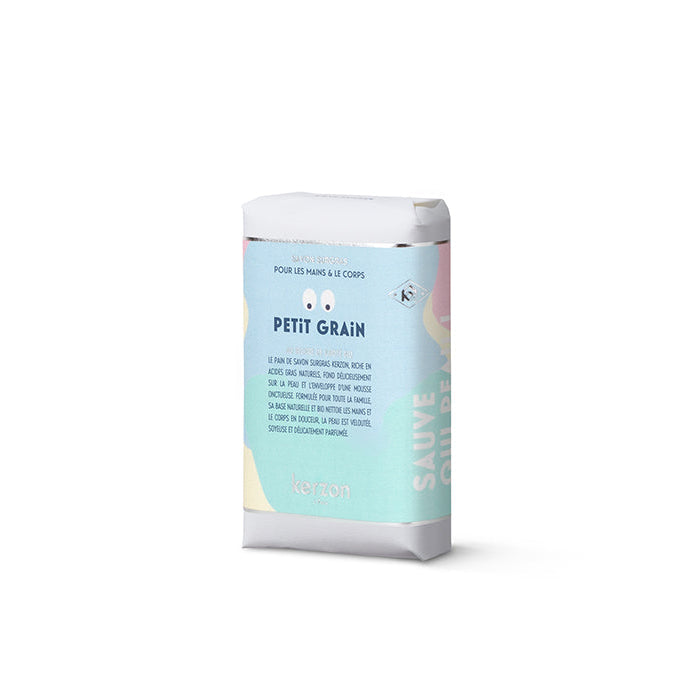 A packaged bar soap with the name 'Petit Grain' indicated on the label, which features a light blue background and graphic elements.