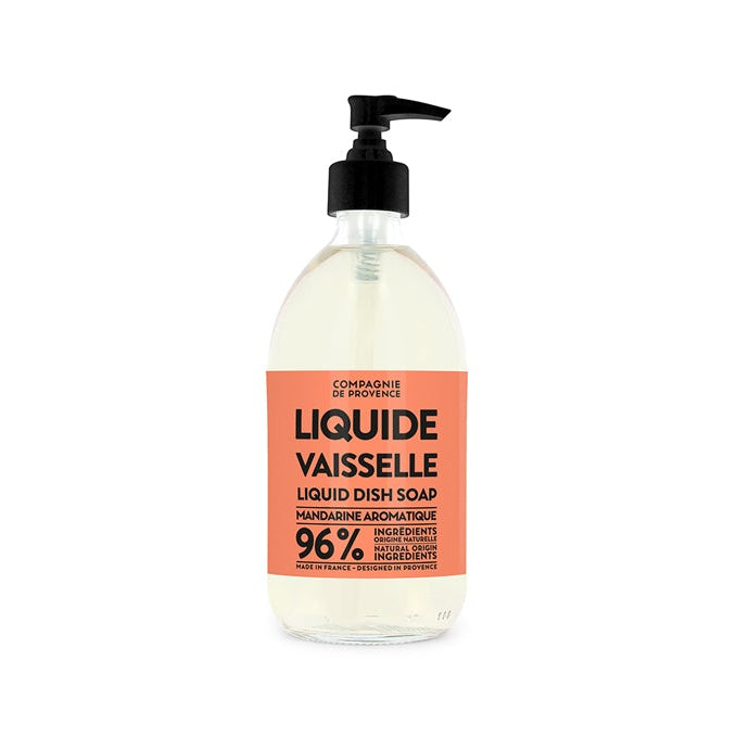 A clear pump bottle of Compagnie de Provence liquid dish soap with label detailing the product as 'Liquide Vaisselle' with 96% natural ingredients, and aromatic mandarin fragrance.