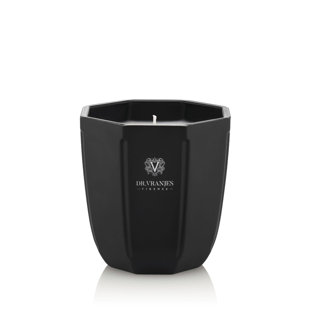 A black scented candle with a geometric patterned glass vessel, containing a single wick candle, with the brand 'BRABANCI' visible on the front.