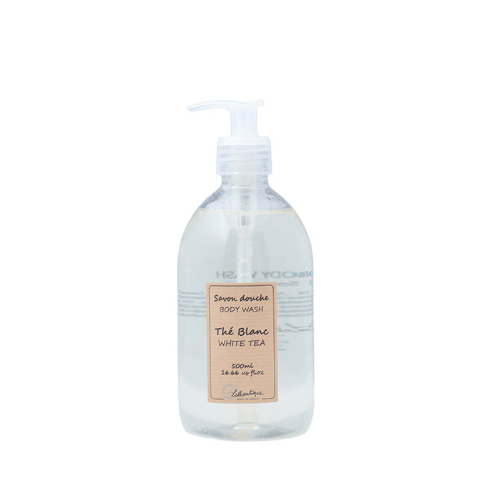A clear plastic bottle with a pump dispenser, labeled as 'Authentique White Tea Body Wash'.