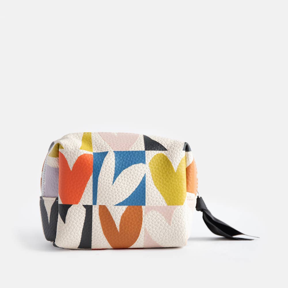 Colorful pouch with geometric pattern on a light gray background