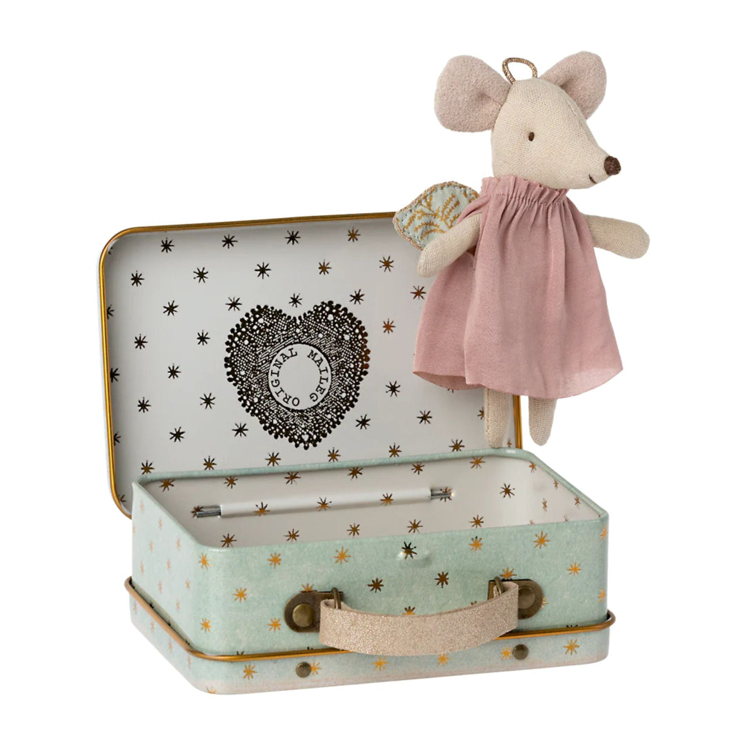Small plush mouse toy in a suitcase with decorative interior
