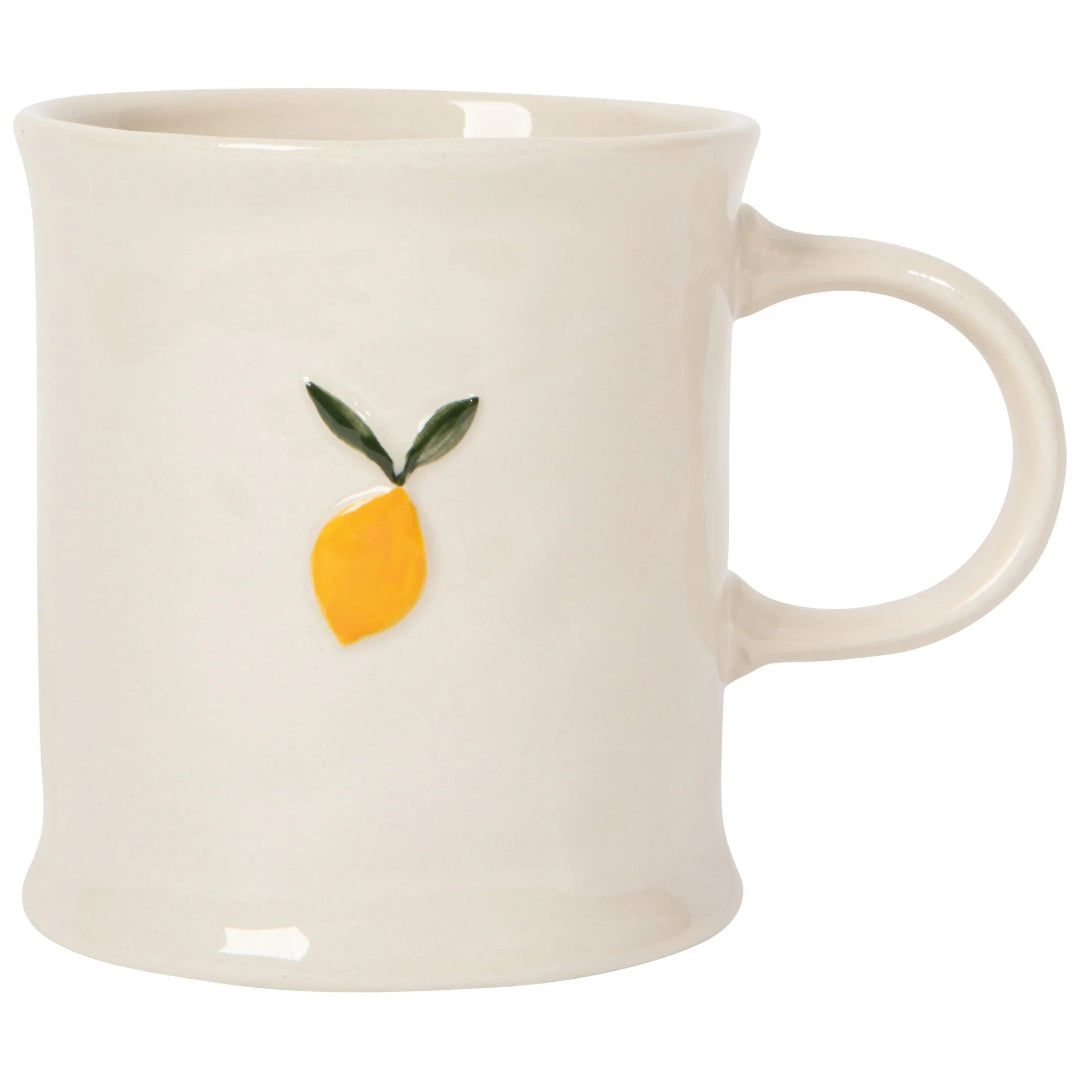 White mug with a lemon design on a white background