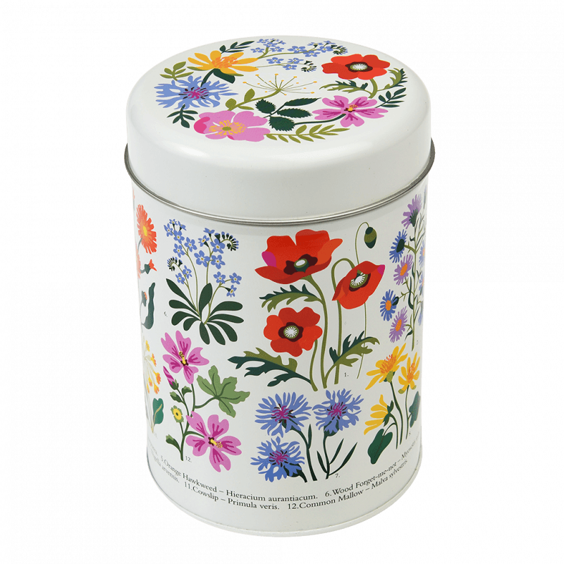 Decorative cylindrical tin with floral design 