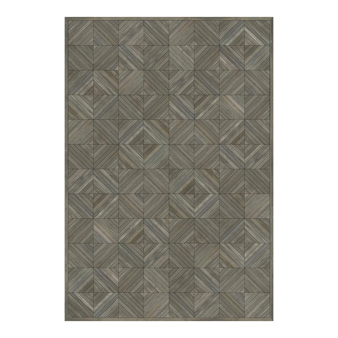 Rectangular rug with a geometric pattern on a white background