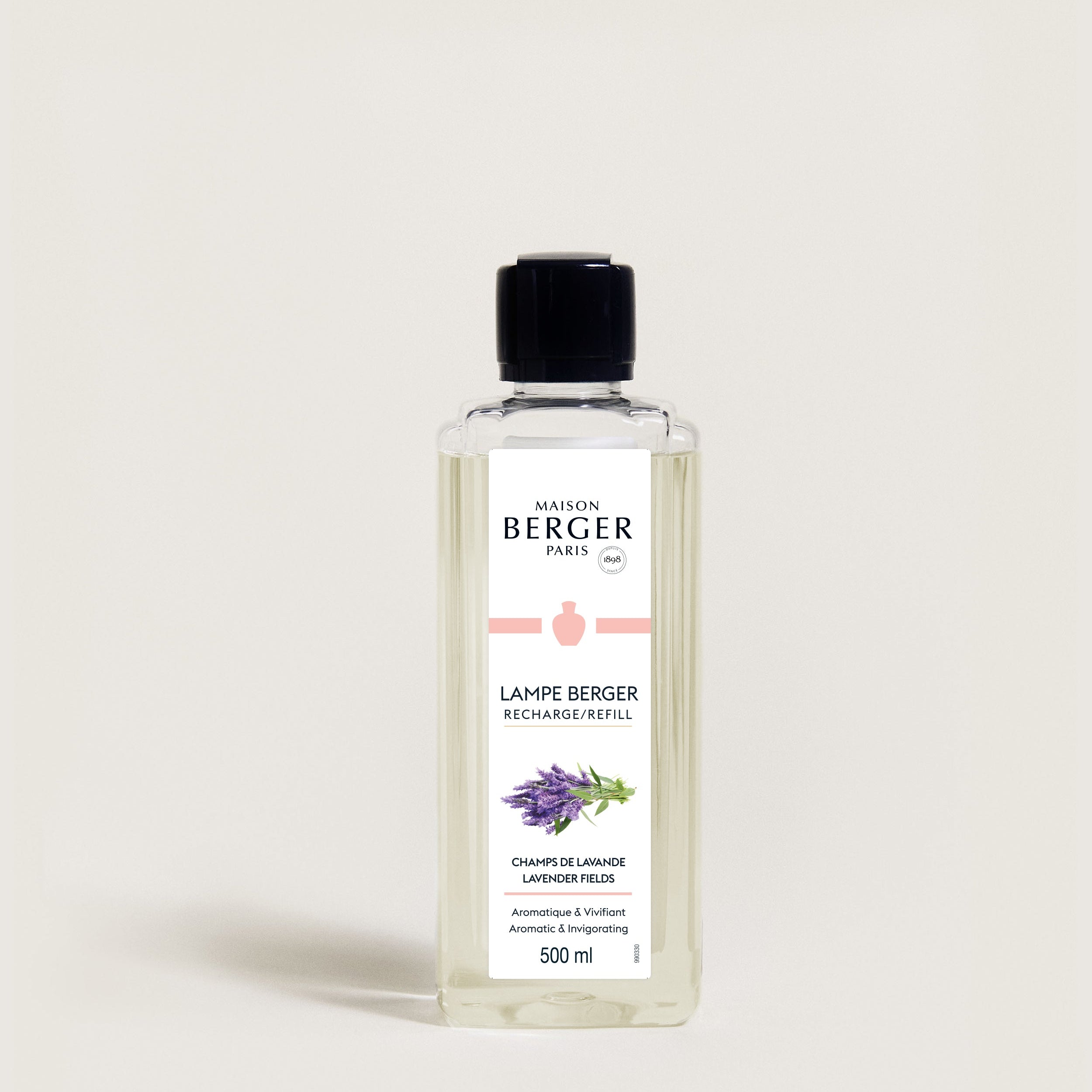 Bottle of Maison Berger refill on a light beige background