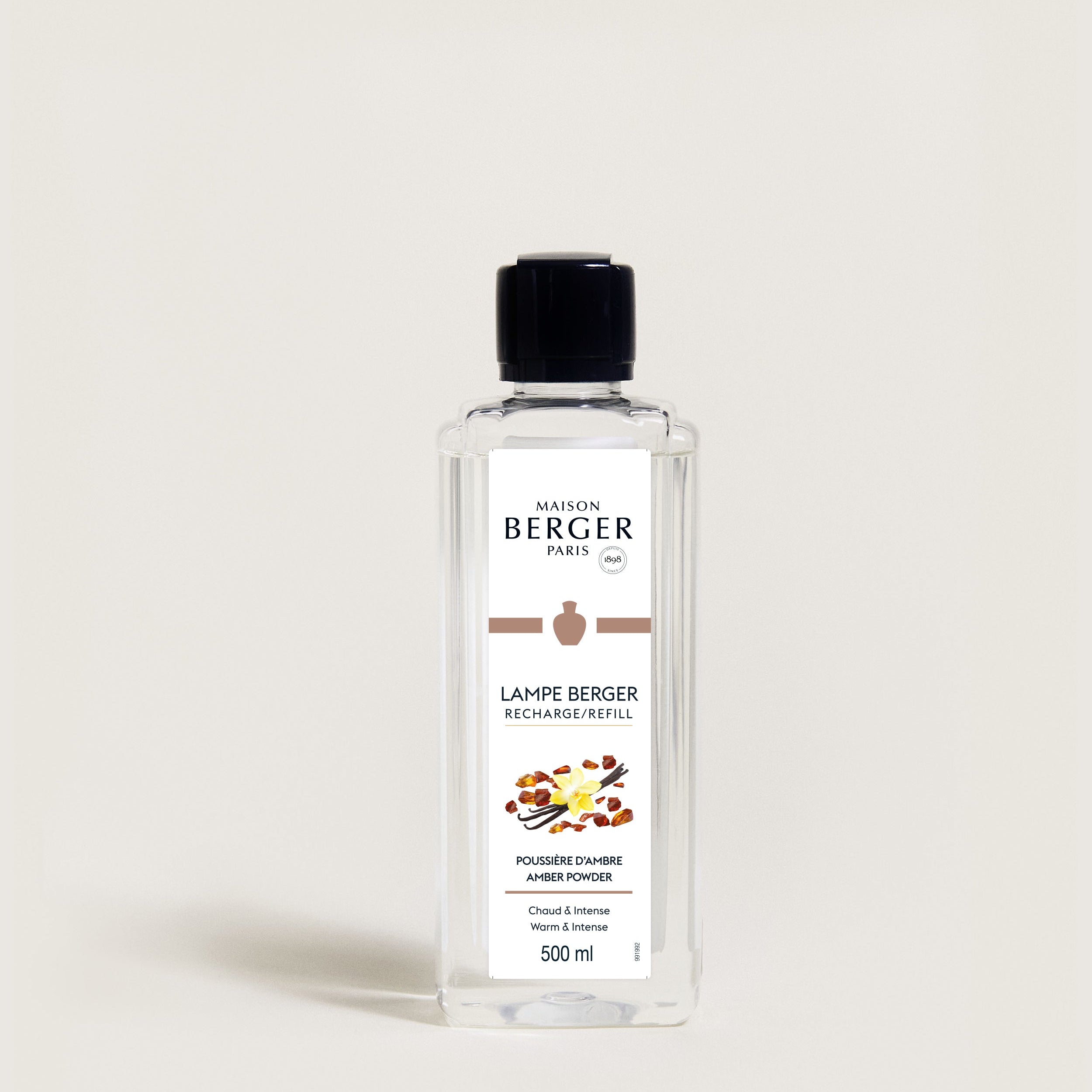 Bottle of Lampe Berger diffuser refill on a light beige background