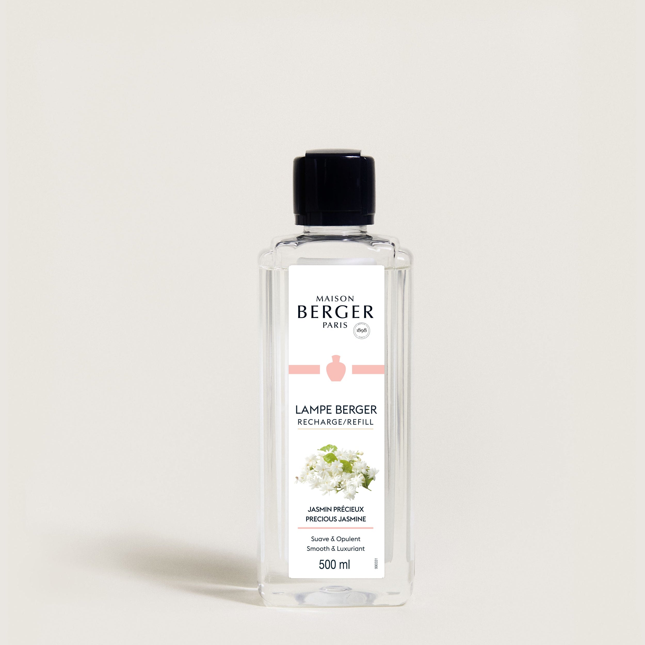 Bottle of Maison Berger lamp refill on a white background