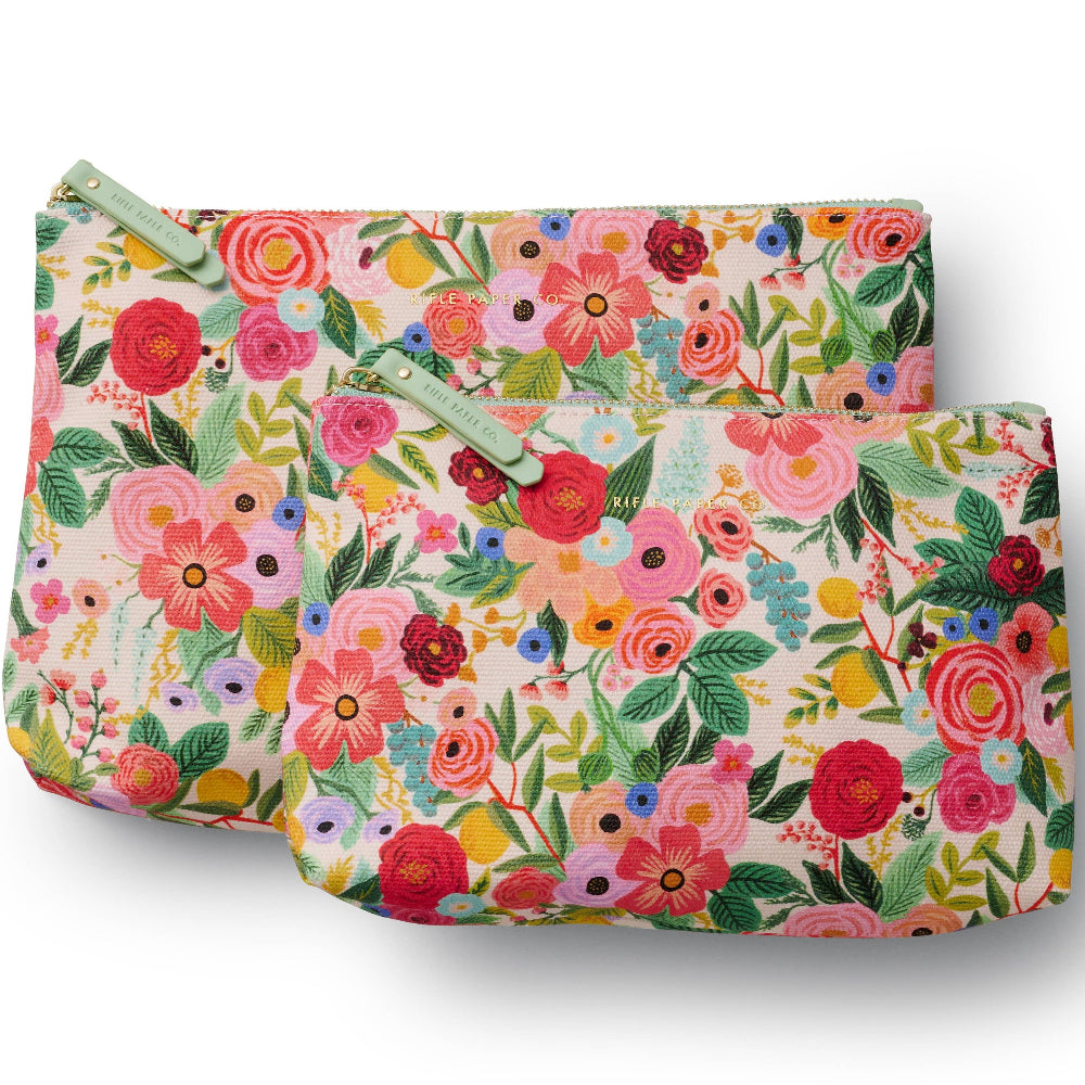 A zippered pouch with a multicolor floral pattern.