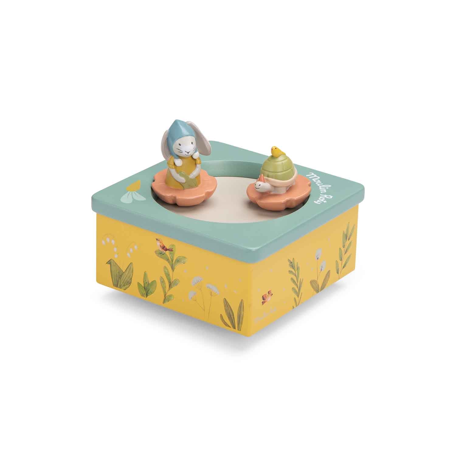 Toy music box with two figurines on a white background
