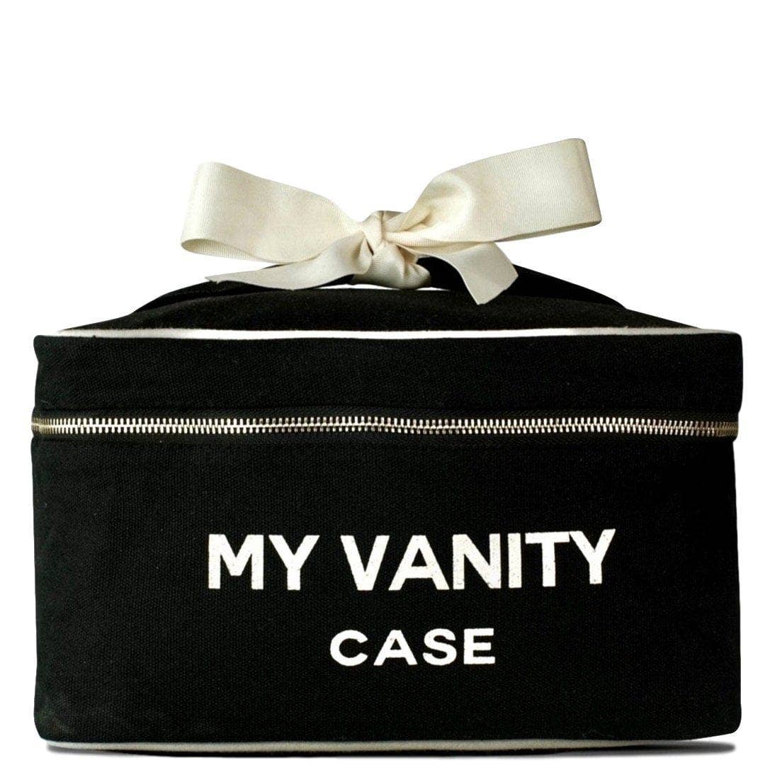 A black beauty case with the text 'MY VANITY CASE' printed on the front, featuring white ribbon bow on top.