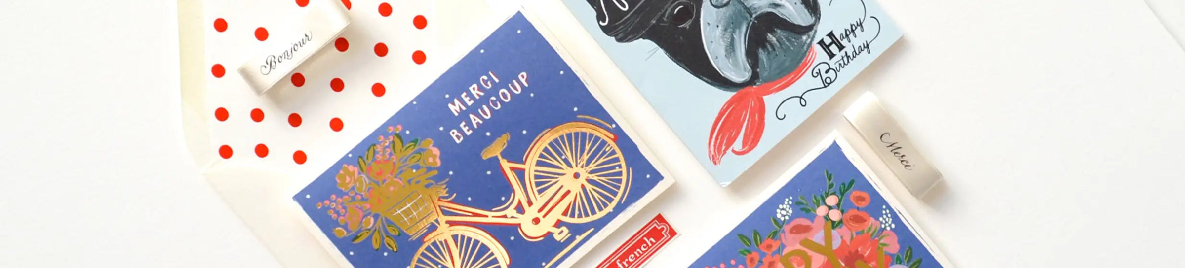 Colorful greeting cards with various designs on a white background