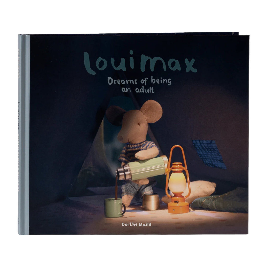 Book titled 'louimax Dreams of being an adult' with a mouse character inside a tent.