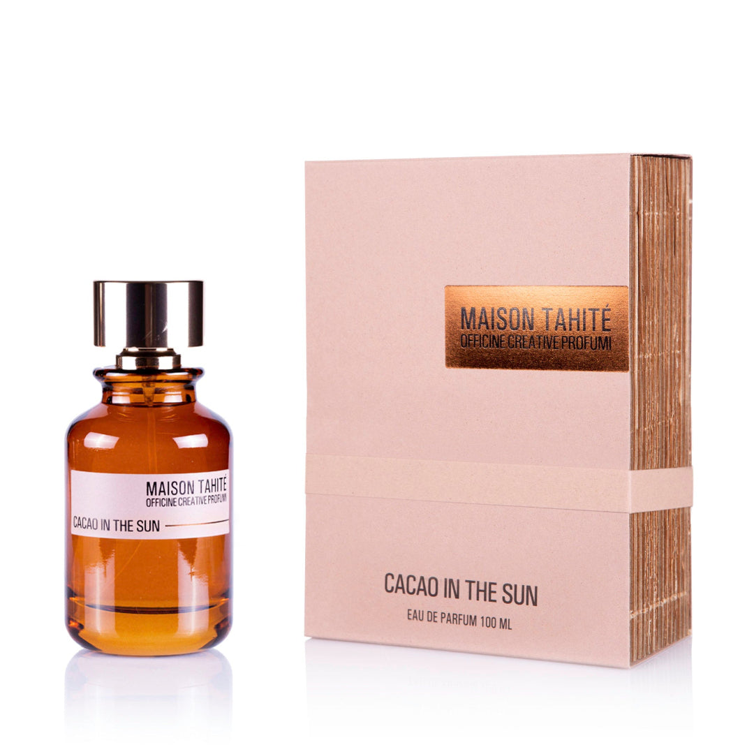 A product image featuring a bottle of 'Cacao in the Sun Eau de Parfum' by Maison Taité next to its packaging box.