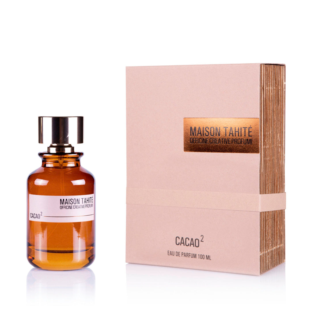 A bottle of Cacao² Eau de Parfum by Maison Tahite, with a box in the background. 