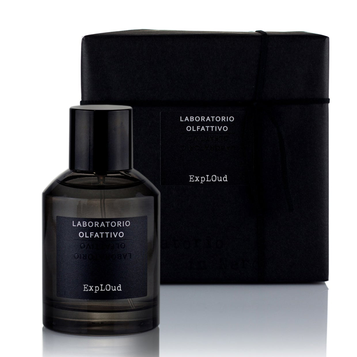 A black bottle of 'ExpLOud' eau de parfum with a dark label, alongside its black packaging box.