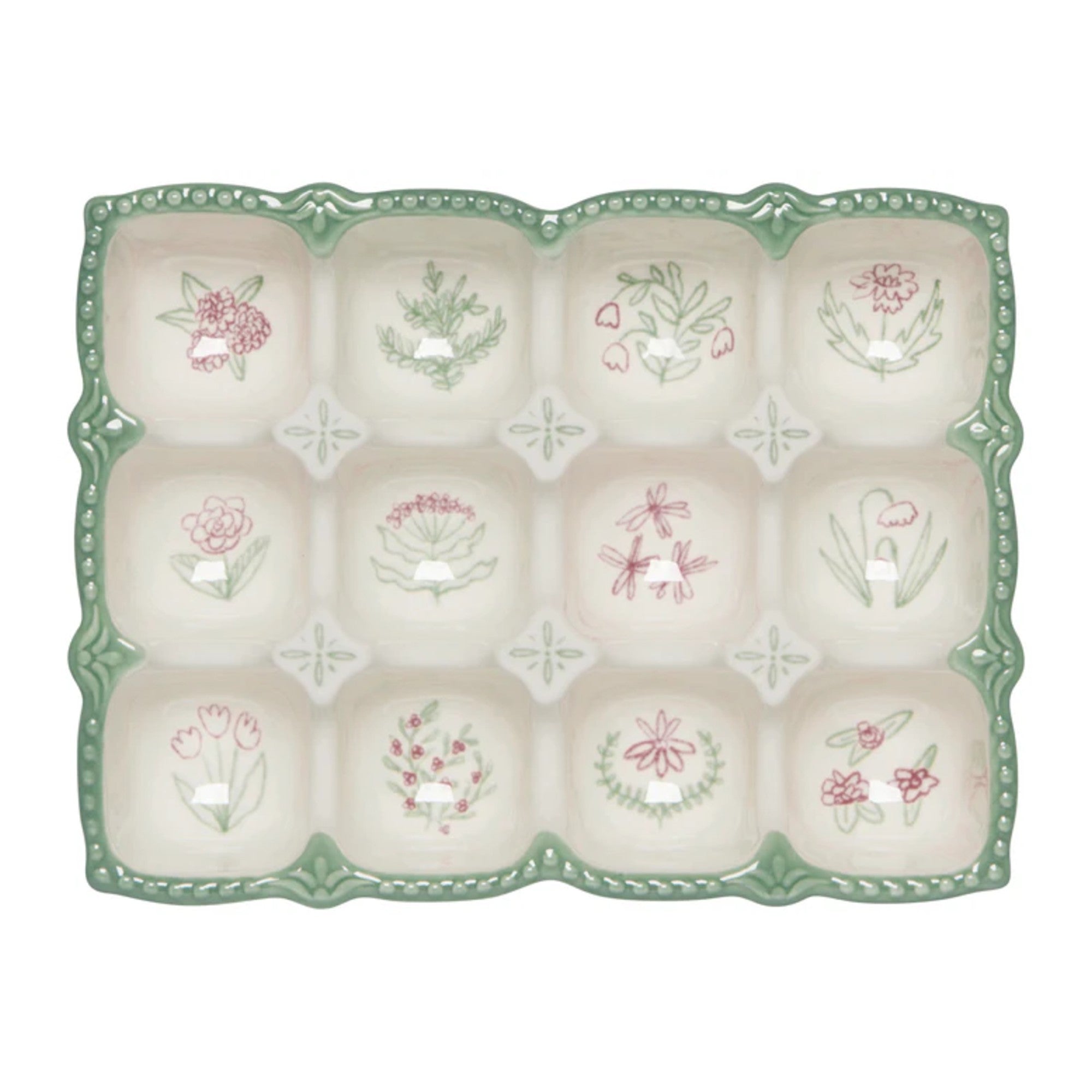 Decorative ceramic plate with floral designs on a white background