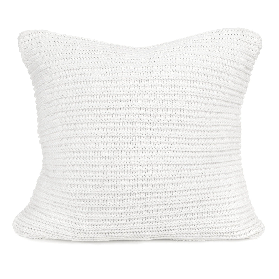 A white textured knit throw pillow