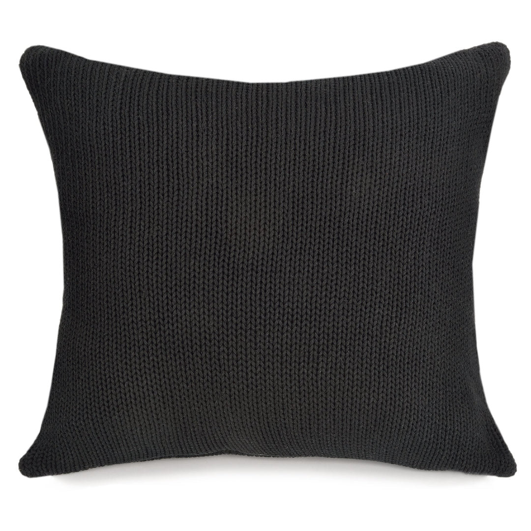 A black knitted square pillow